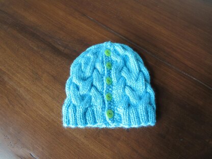 Cozy Cables Ponytail Hat