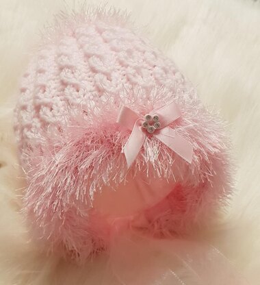 Holly swing coat with fur trim baby knitting pattern