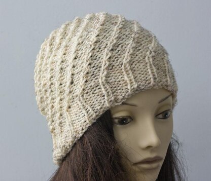 Knit Spiral Hat Knitting pattern by Judith Stalus | LoveCrafts