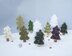 Many Christmas trees knitted flat