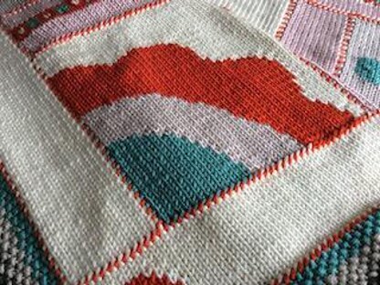 Alice The 4th knitted cosy blanket