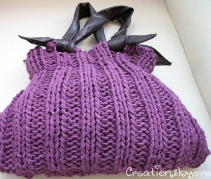 Cables and bobbles handbag