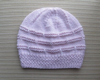 Pink Hat with Garter Stripes and Slipped Stitches for a Lady