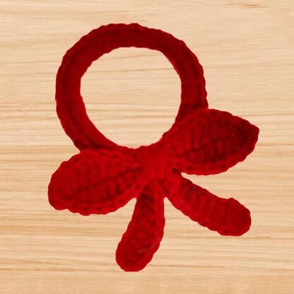 A crochet scrunchie bow