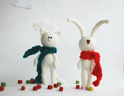 White rabbit in the red scarf and White cat in the dark green scarf