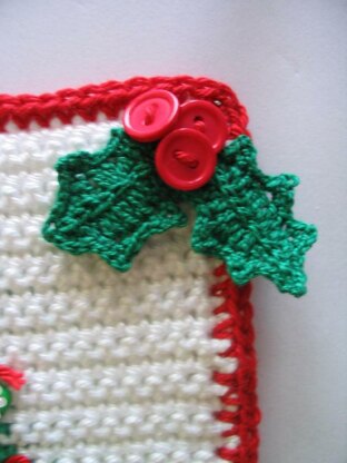 Christmas tree potholder with holly leaf clusters