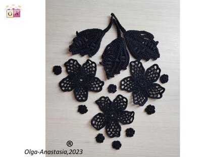 Crochet composition of flowers and leaves in black
