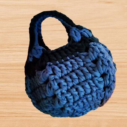 A crochet round bag