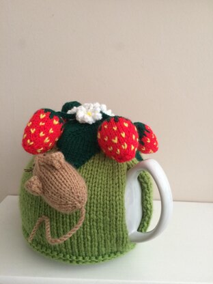 Nature tea cosy. Animal tea cosy .Pesky mouse in the strawberry patch