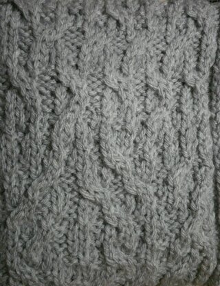 Tangled up cable knit scarf