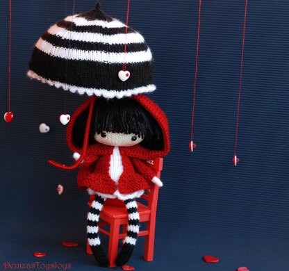 Eugene. The Doll in striped stockings with big umbrella.