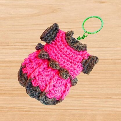 A crochet min dress keychain