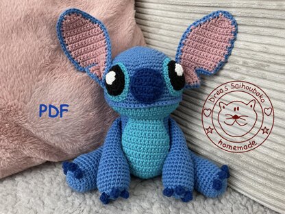 Blue alien amigurumi doll