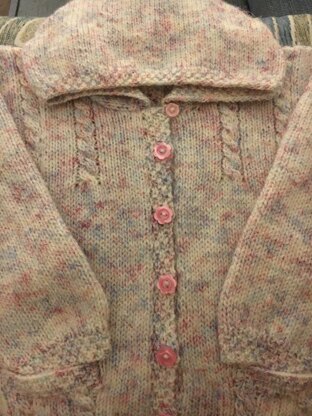 Ada’s pink cardigan with pockets
