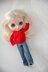 Knitted red cardigan for doll