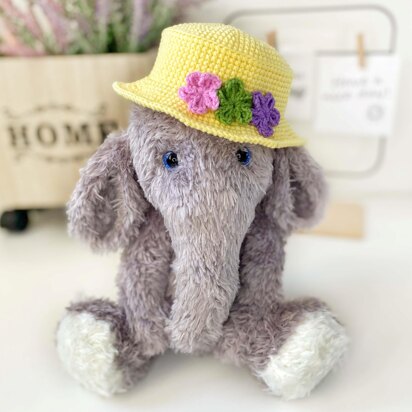 Cute stuffed elephant in a hat