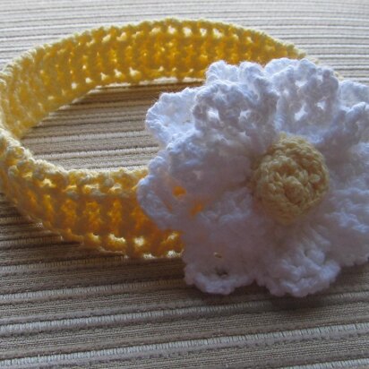 Yellow Knitted Headband with a White Flower