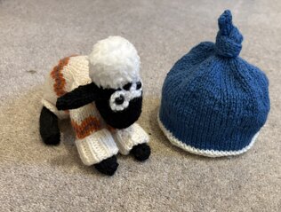 Second hat for new grandson from the  left over yarn.