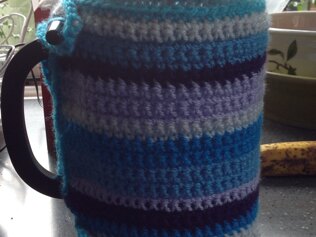 Crocheted coffee cosy