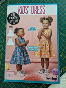 Two little girl's dresses