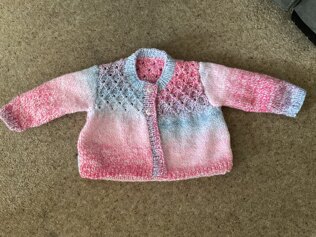 Smocked baby cardigan