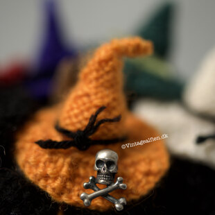 Witchella for Halloween - hats on a pumpkin
