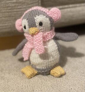 Christmas penguin either stuffed or chocolate orange cover