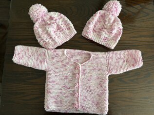 Hats for Sarah and Yvonne's expected baby girls.