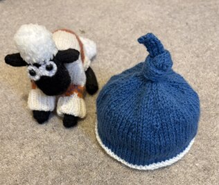 Second hat for new grandson from the  left over yarn.