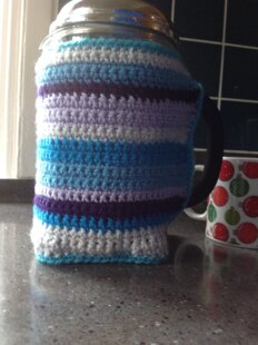 Crocheted coffee cosy