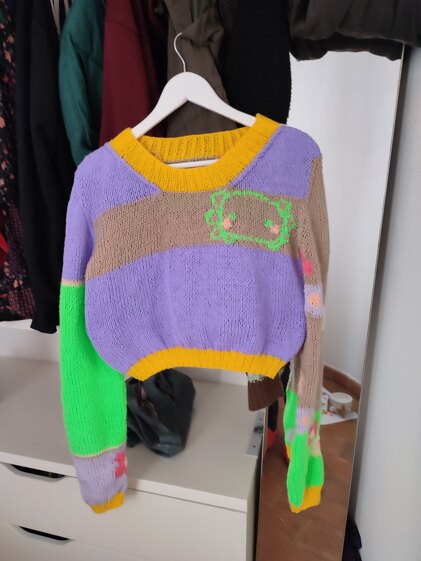 happy axolotl sweater
