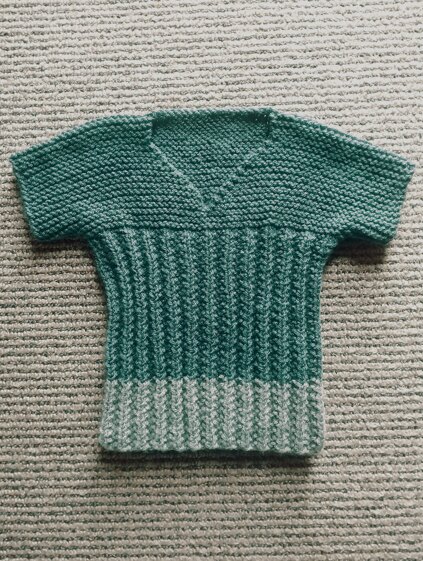 Vest with garter stitch yoke