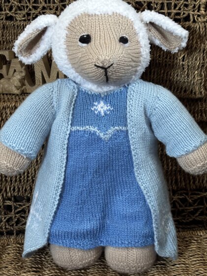 Sheep in a dress and jacket