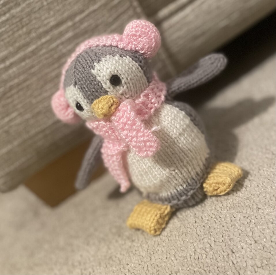 Christmas penguin either stuffed or chocolate orange cover