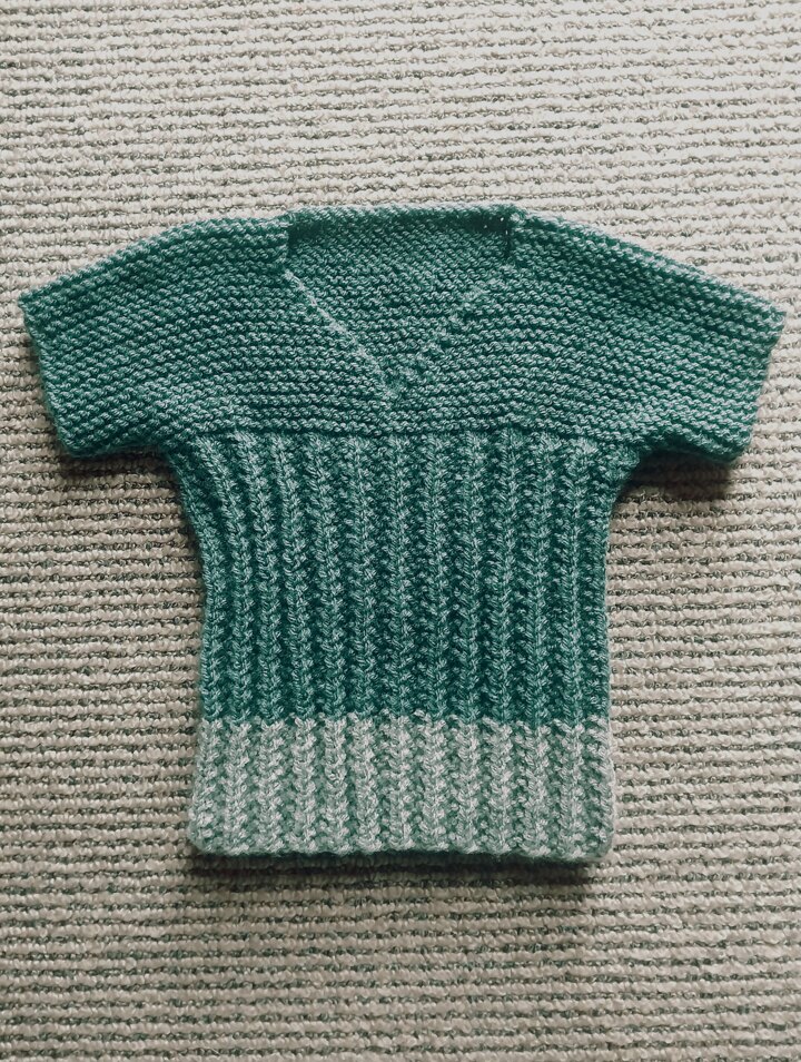 Vest with garter stitch yoke