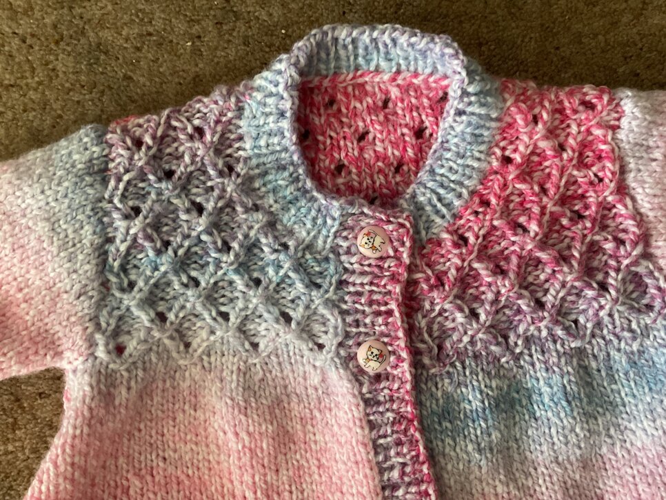 Smocked baby cardigan